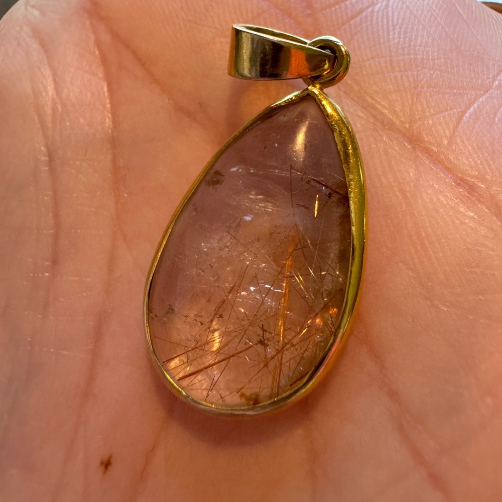 Natural angle hair with real gold custom made “lucky pendant”